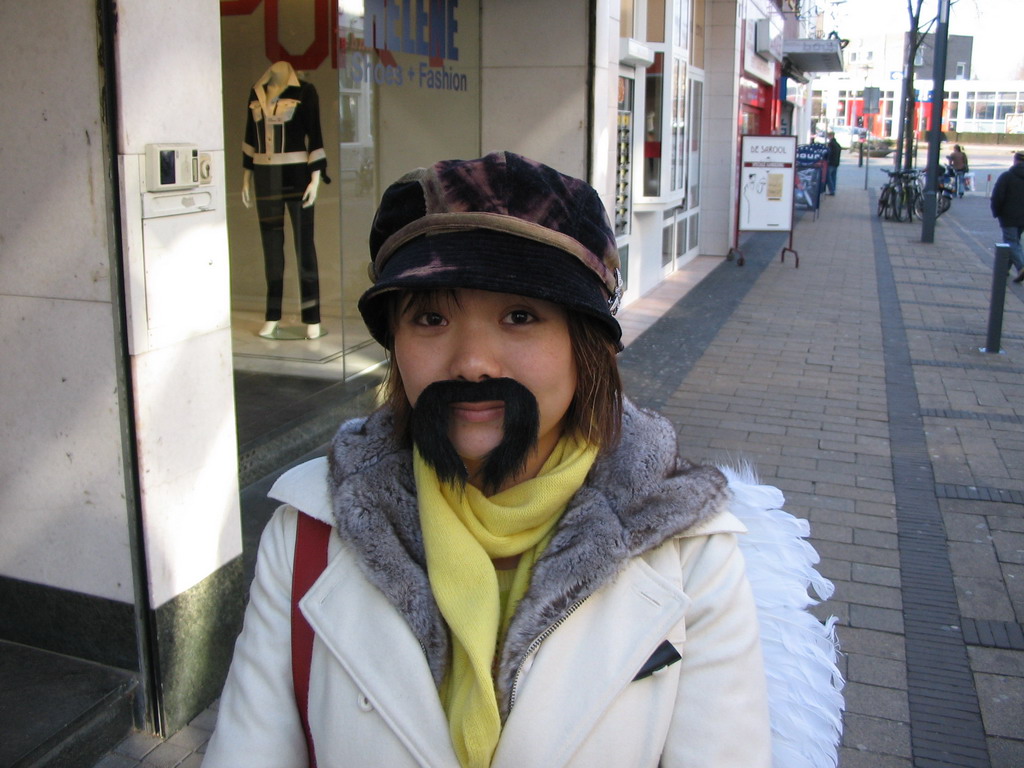 Miaomiao with a fake mustache at the Saroleastraat at Heerlen