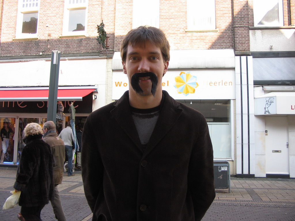 Tim with a fake mustache at the Saroleastraat at Heerlen