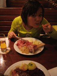 Miaomiao having dinner at a restaurant in the city center