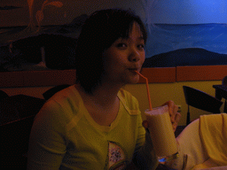 Miaomiao having a drink at a bar in the city center