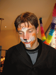 Tim with face paint at a restaurant in the city center