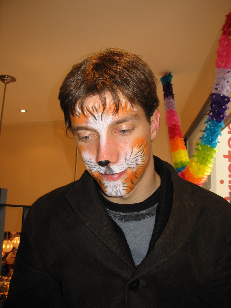 Tim with face paint at a restaurant in the city center