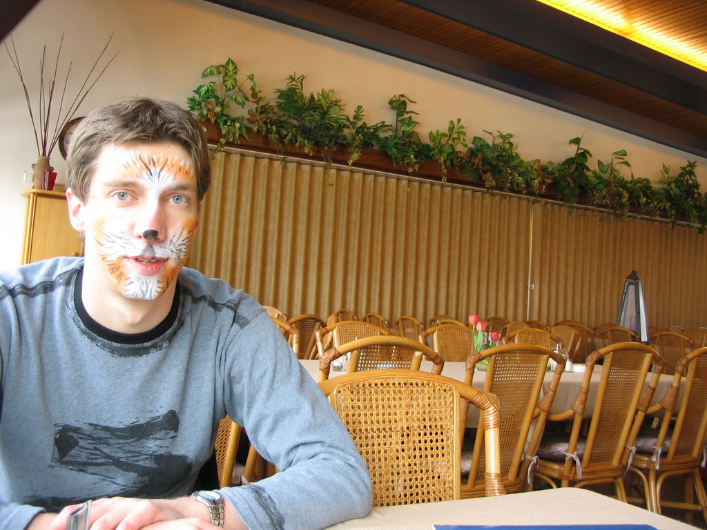 Tim with face paint at the restaurant of the Wilhelminatoren tower at Vaals