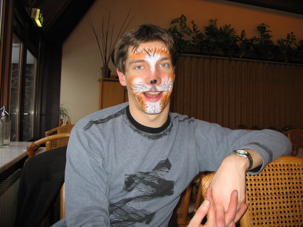 Tim with face paint at the restaurant of the Wilhelminatoren tower at Vaals