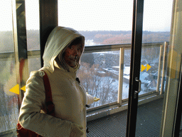 Miaomiao with face paint at the viewing tower at the border triangle at Vaals, with a view on the Drielandenpunt Labyrinth