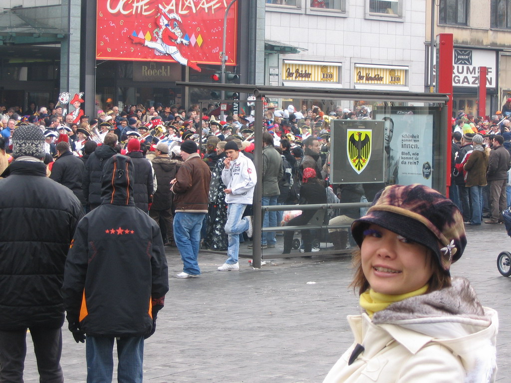 Miaomiao with fake eyelashes and Carnaval Parade at the Friedrich-Wilhelm-Platz square