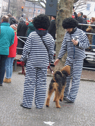 People wearing prisoner costumes at the Friedrich-Wilhelm-Platz square