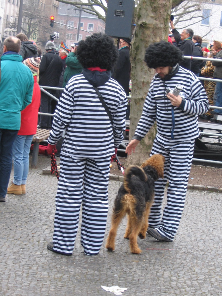 People wearing prisoner costumes at the Friedrich-Wilhelm-Platz square