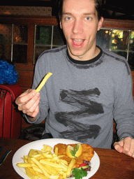 Tim having lunch at a restaurant in the city center