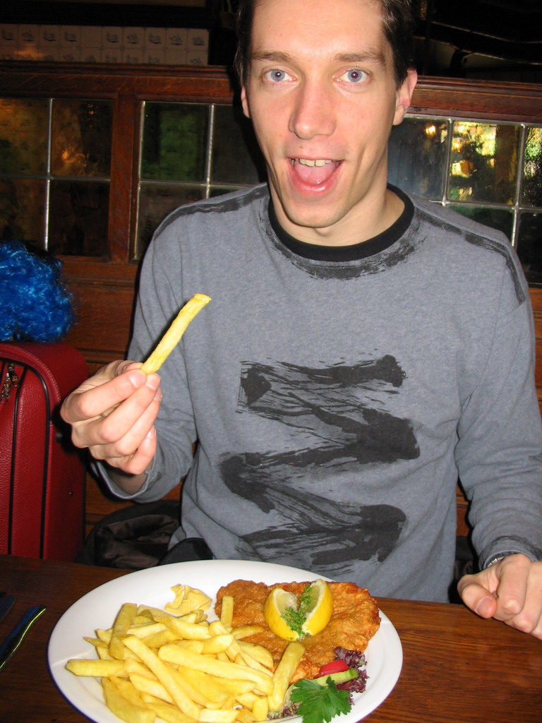 Tim having lunch at a restaurant in the city center