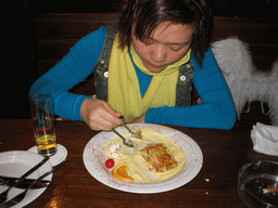 Miaomiao having lunch at a restaurant in the city center