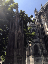 The Vinzenzbrunnen fountain and the southeast side of the Aachen Cathedral at the Münsterplatz square