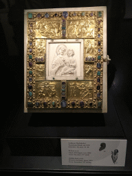 Golden book cover at the Ground Floor of the Aachen Cathedral Treasury, with explanation