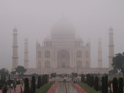 Charbagh Garden with the reflecting pool and the front of the Taj Mahal, in the mist