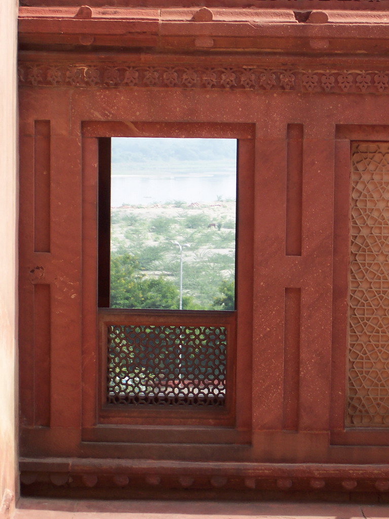 The Yamuna river, viewed through a window at the Agra Fort