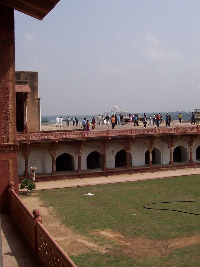 Gardens and walls at the Khas Mahal palace at the Agra Fort, with a view on the Taj Mahal