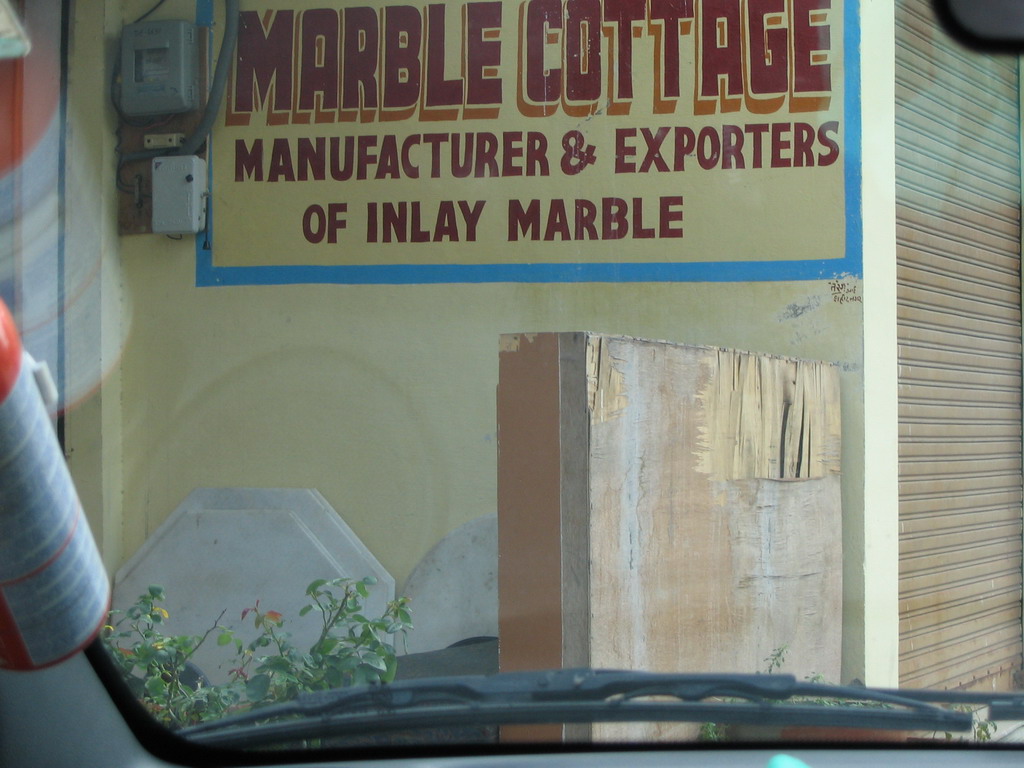 Sign in front of the Marble Cottage on the road to Sikandra