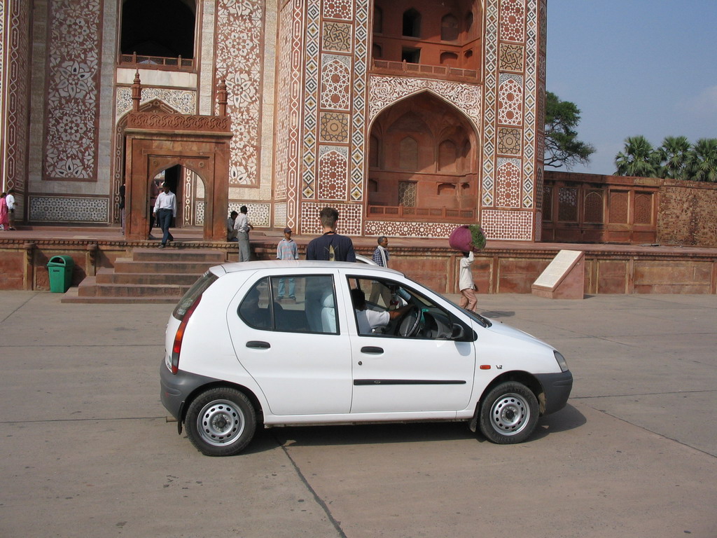 David and our car in front of the entrance gate to Akbar`s Tomb at Sikandra