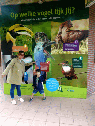 Miaomiao and Max with photographs of birds at the Vogelpark Avifauna zoo