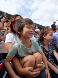 Miaomiao and Max sitting on the grandstand at the Vogelpark Avifauna zoo, just before the bird show