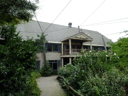 Cuba Aviary with the west side of the Casa Havana restaurant at the Vogelpark Avifauna zoo