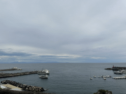 Piers of the Amalfi Harbour, viewed from the rental car on the Amalfi Drive