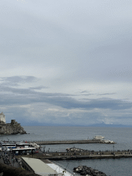 Piers of the Amalfi Harbour, viewed from the rental car on the Amalfi Drive