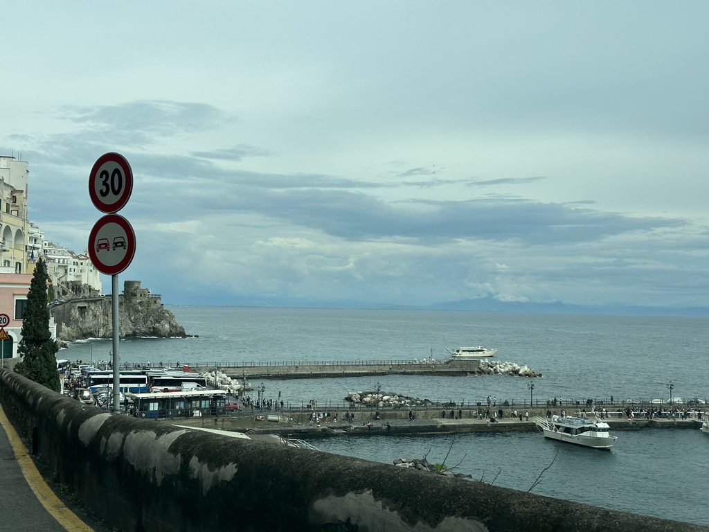 Piers of the Amalfi Harbour, viewed from the rental car on the Amalfi Drive