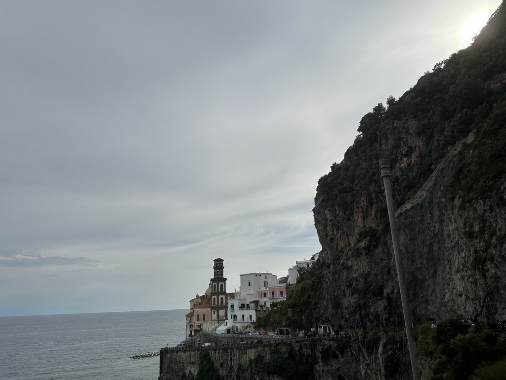 Houses and the Collegiate Santa Maria Maddalena church at Atrani, viewed from the rental car on the Strada Statale Amalfitana street