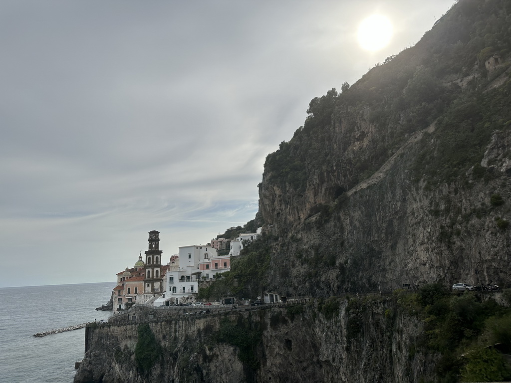 Houses and the Collegiate Santa Maria Maddalena church at Atrani, viewed from the rental car on the Strada Statale Amalfitana street