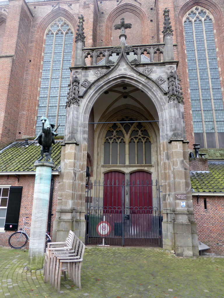 Gate and equestrian statue of Saint George at the north side of the Sint-Joriskerk church at the Groenmarkt square