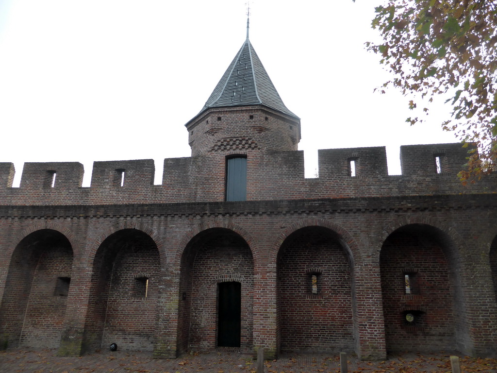 City wall with tower at the Achter de Kamp street