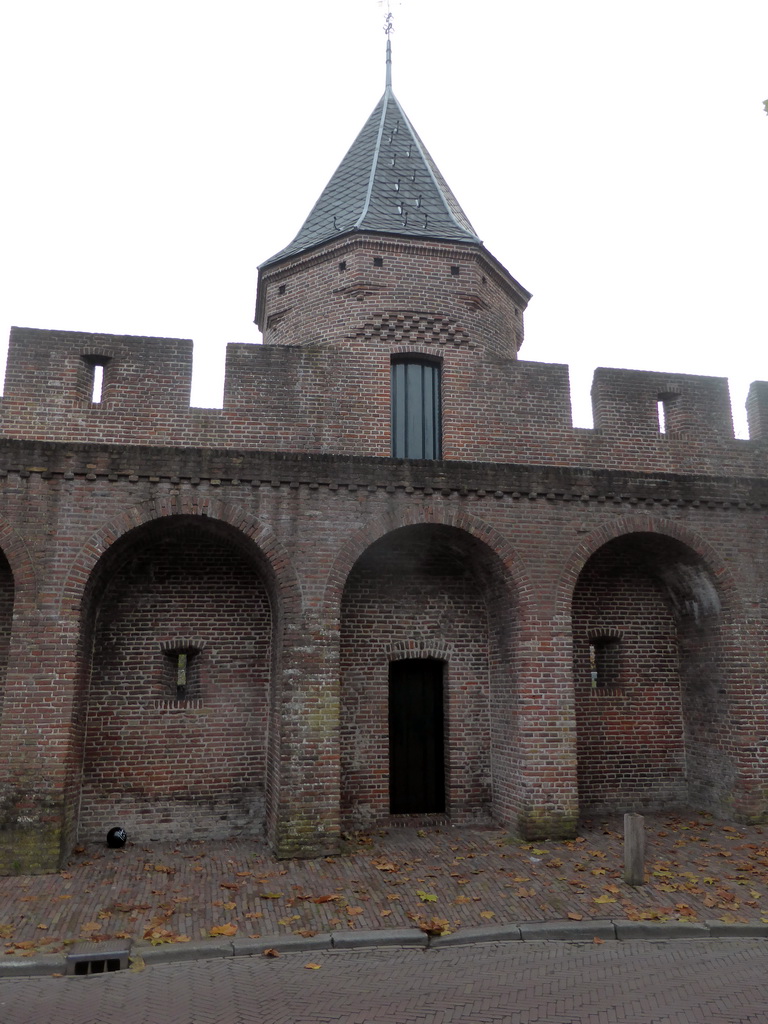 City wall with tower at the Achter de Kamp street