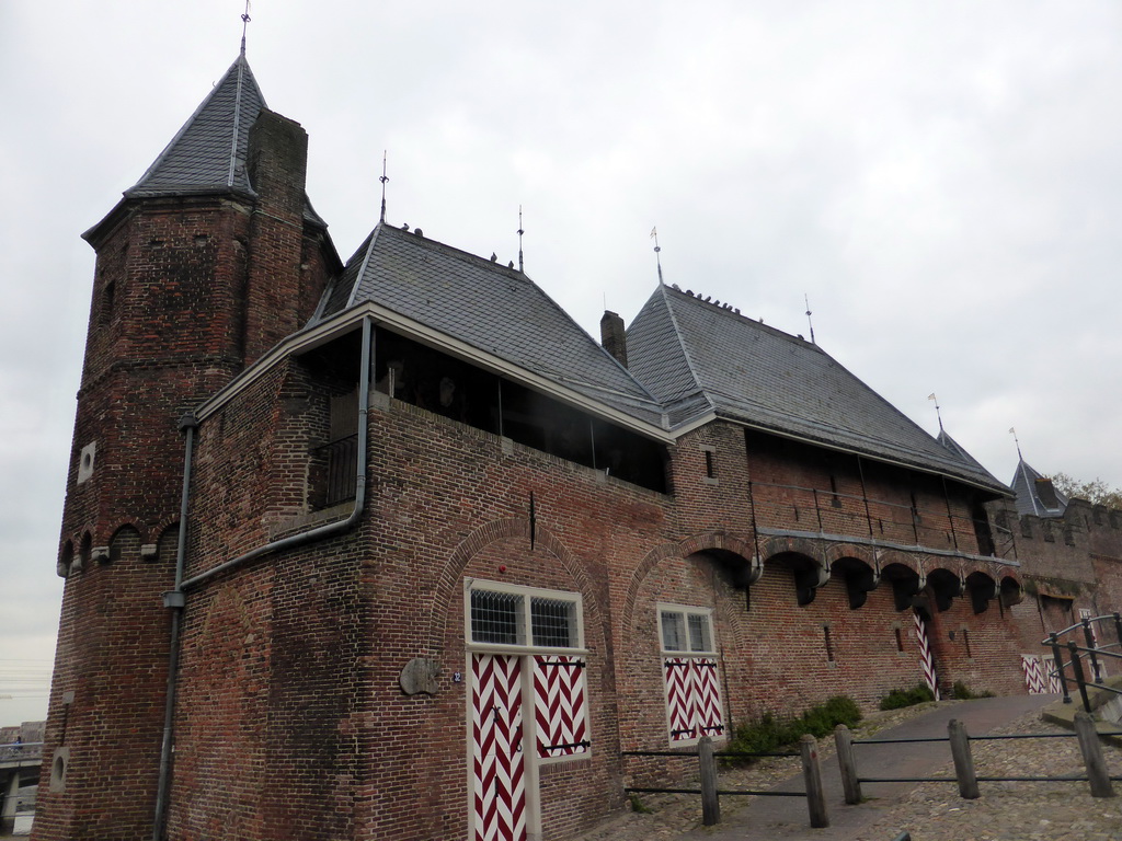 Left back side of the Koppelpoort gate at the Kleine Spui street