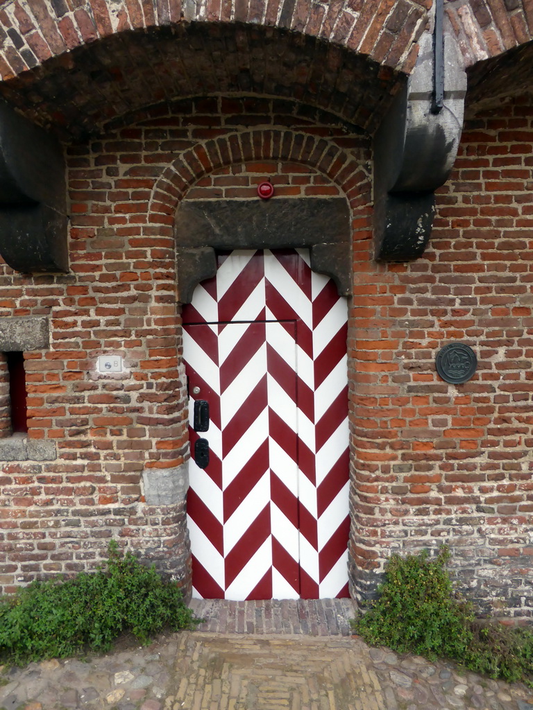 Door at the back side of the Koppelpoort gate