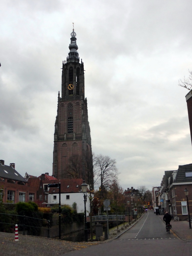 The Westsingel street and the Onze Lieve Vrouwetoren tower, viewed from the Bollebruggang street, at sunset