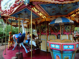 Max on a Dolphin statue at the Carousel at the Pretplein square at the DierenPark Amersfoort zoo