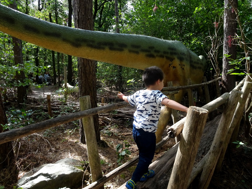 Max on a walking bridge at the DinoPark at the DierenPark Amersfoort zoo