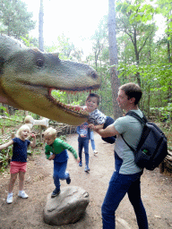 Tim and Max with an Albertosaurus statue at the DinoPark at the DierenPark Amersfoort zoo