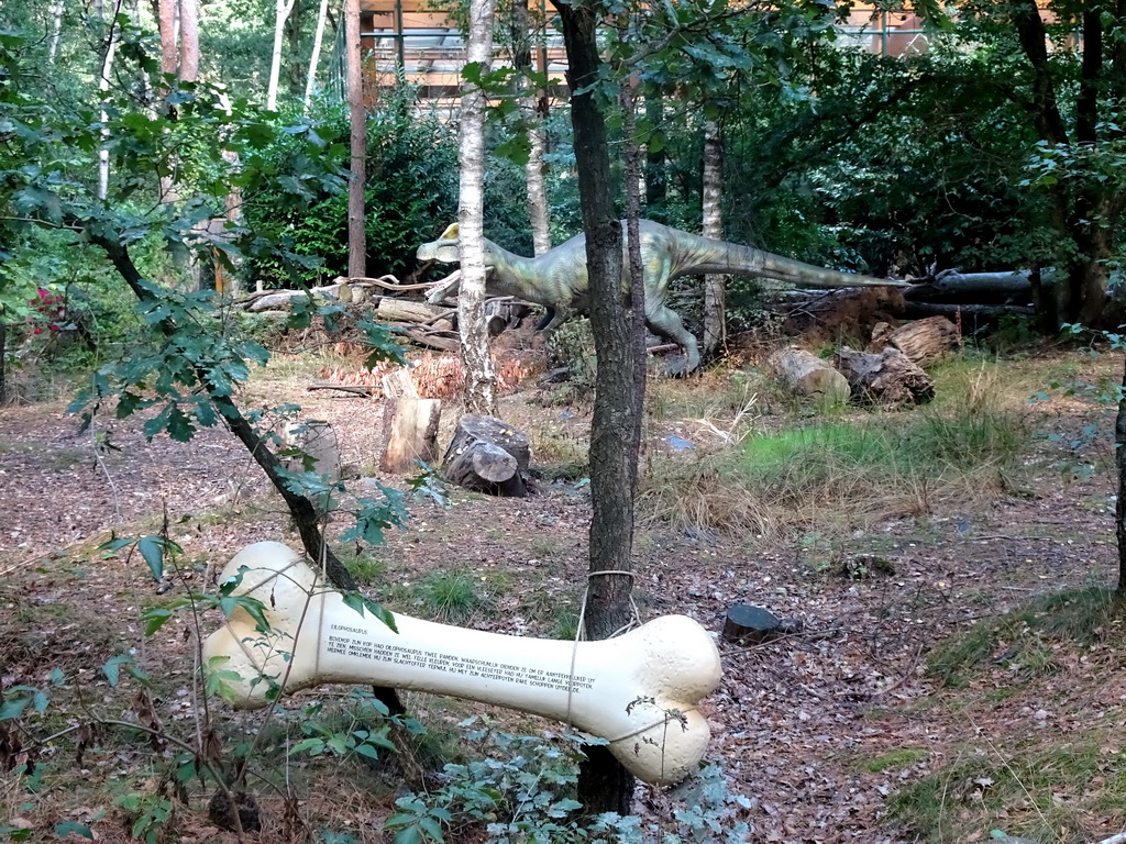 Dilophosaurus statue at the DinoPark at the DierenPark Amersfoort zoo, with explanation