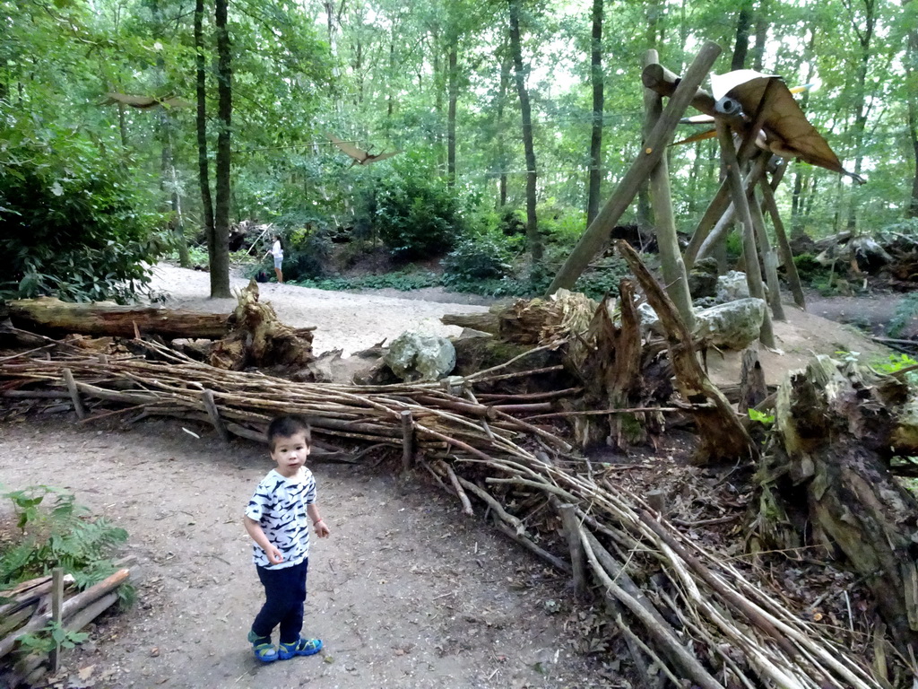 Max with a Pteranodon statue at the DinoPark at the DierenPark Amersfoort zoo