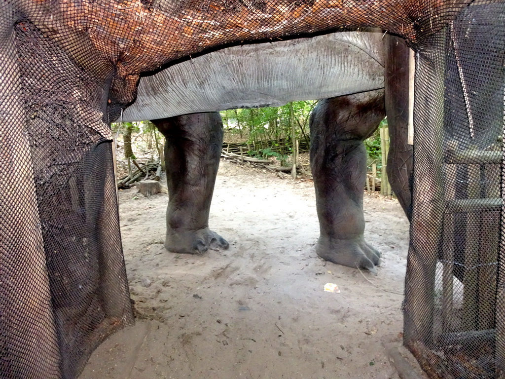 Exit of a cave under a Brachiosaurus statue at the DinoPark at the DierenPark Amersfoort zoo