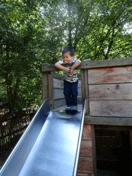 Max on a slide at a playground at the DinoPark at the DierenPark Amersfoort zoo