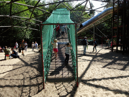 Max on a walking bridge at the playground near the Restaurant Buitenplaats at the DierenPark Amersfoort zoo