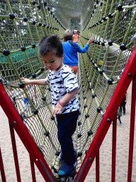 Max on a rope bridge at the playground near the Restaurant Buitenplaats at the DierenPark Amersfoort zoo
