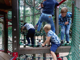 Max on a rope bridge at the playground near the Restaurant Buitenplaats at the DierenPark Amersfoort zoo