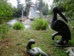 Pelican and Snake statues and Japanese Macaques at the DierenPark Amersfoort zoo