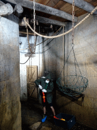 Zookeeper feeding the Egyptian Fruit Bats at the City of Antiquity at the DierenPark Amersfoort zoo