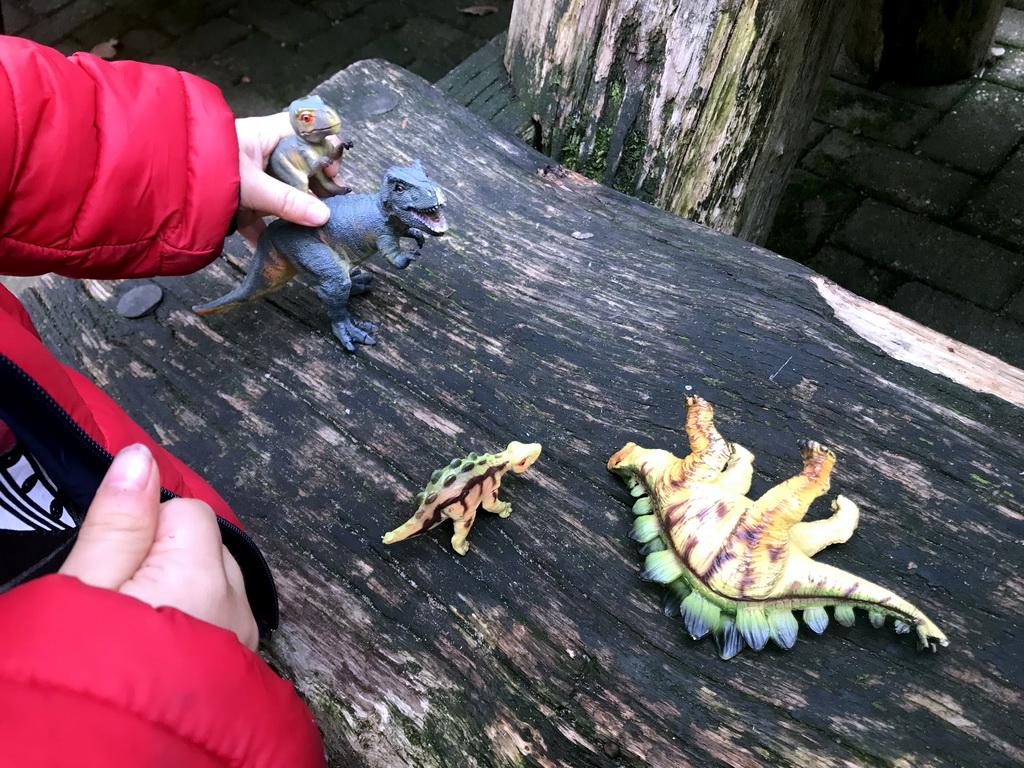 Max playing with dinosaur toys at the DierenPark Amersfoort zoo