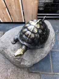 Turtle statue at the enclosure of the African Penguins at the DierenPark Amersfoort zoo